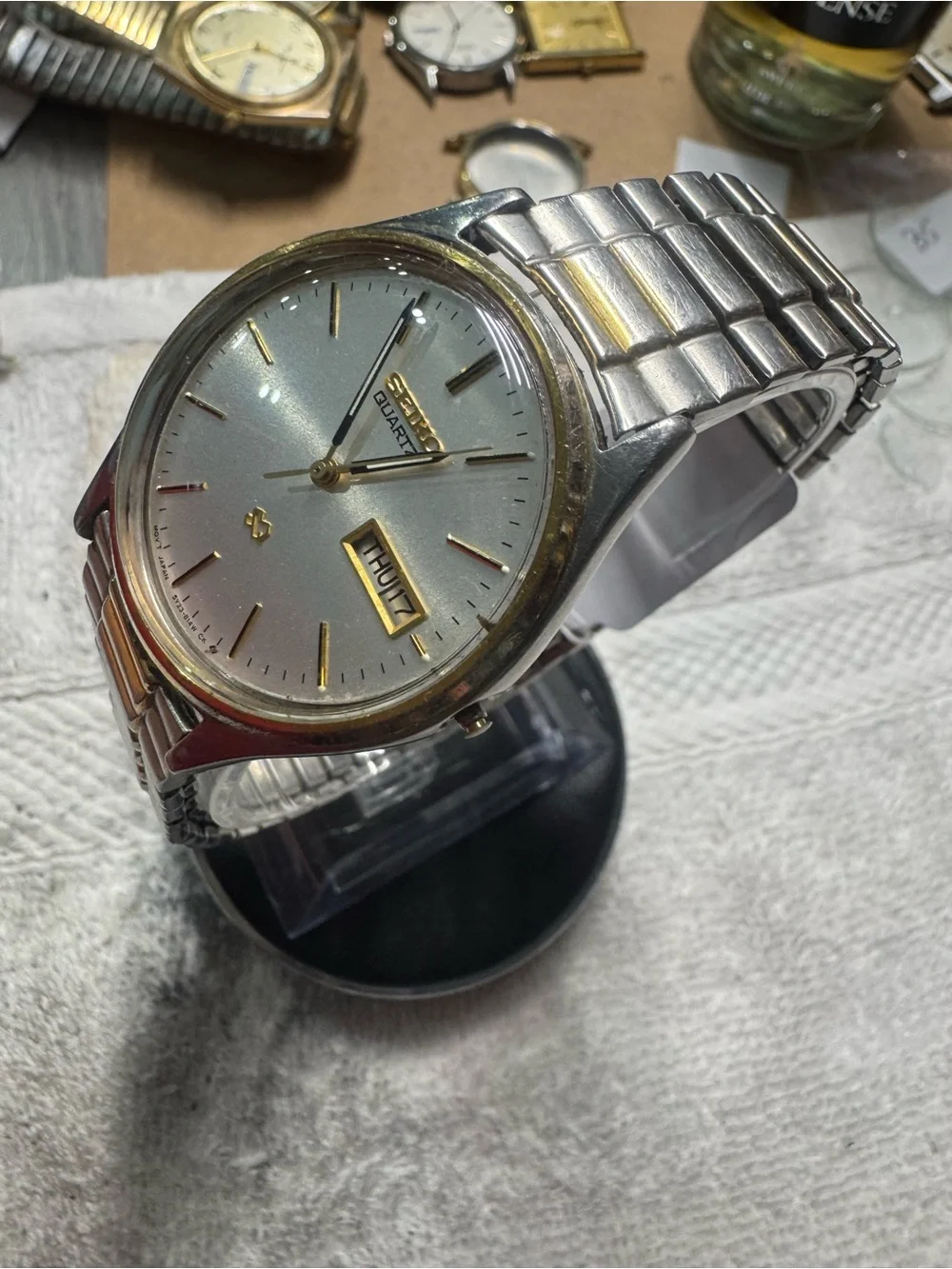 Seiko Two-Tone Silver and Gold Men's Quartz Watch with Day-Date